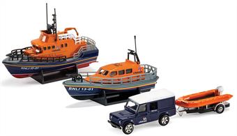 The Corgi RNLI gift set includes models of the Shannon and Severn class all-weather deep sea lifeboats plus a flood rescue response unit with Land Rover and D class inshore lifeboat on trailer.