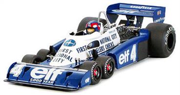 Tamiya 1/20 Tyrell P34 Monaco F1 1977This 1/20 scale model kit depicts the Tyrrell P34 as it appeared in the Monaco GP, 1977 with the same half engine cowling of the previous season. The model captures the unique form of the Tyrrell P34 with rear seat cowl, front brake cooling air duct, stabilizer, rear wing side plate, and taillight. Ford Cosworth DFV engine portrayed with the utmost detail - Gearbox, ignition, and wheels are all precisely recreated - Driver figure included - Markings included for recreation of two machines: #3, R. Peterson and #4, P. Depailler. Photo shows completed and painted model.Glue and paints are required to assemble and complete the model (not included)Click the More link for related products.