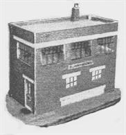 A card model kit of the GWR Austerity design signal box.These flat-roofed brick and concrete construction signal box were built during WW2 and afterwards. Some replaced boxes damaged by enemy action, others were installed to control military siding connections. Several of these solid buildings remain standing today, some after many years of disuse.